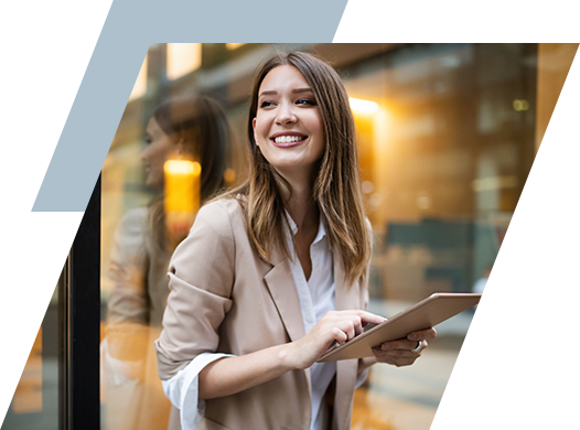 Photo of young woman using a mobile tablet to review checking account information.